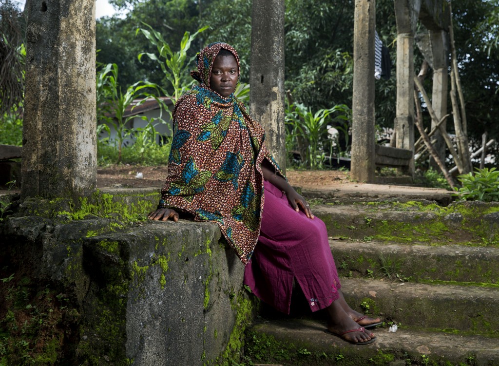 Kadiatu Koromoa sits for a portrait in Jonathon Torgovnik's 'Girl Soldier'