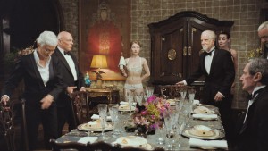 At the silver service dinner, Lucy is set apart for her youth and beauty