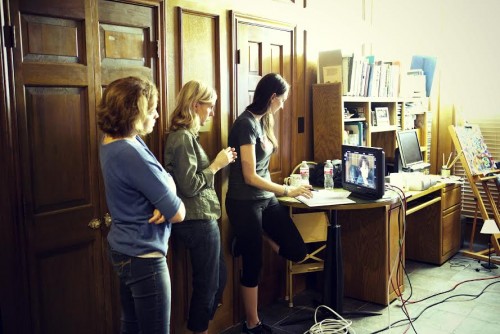 Producers and friends Augustine Frizzell, Liz Franke and Kelly Snowden watching the monitor on Franke’s short film, Treading Water.