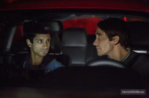 Rick (Riz Ahmed) enduring the Mad hatter that is Bloom (Jake Gyllenhaal)