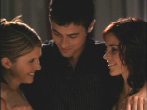 Ashley (right) finds herself torn over her feelings for both Aiden and Spencer (left) on South of Nowhere.