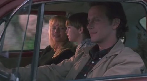 The Torrance family happily driving to the Overlook Hotel