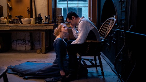 Jessica Chastain sits at Colin Farrell's feet in Miss Julie